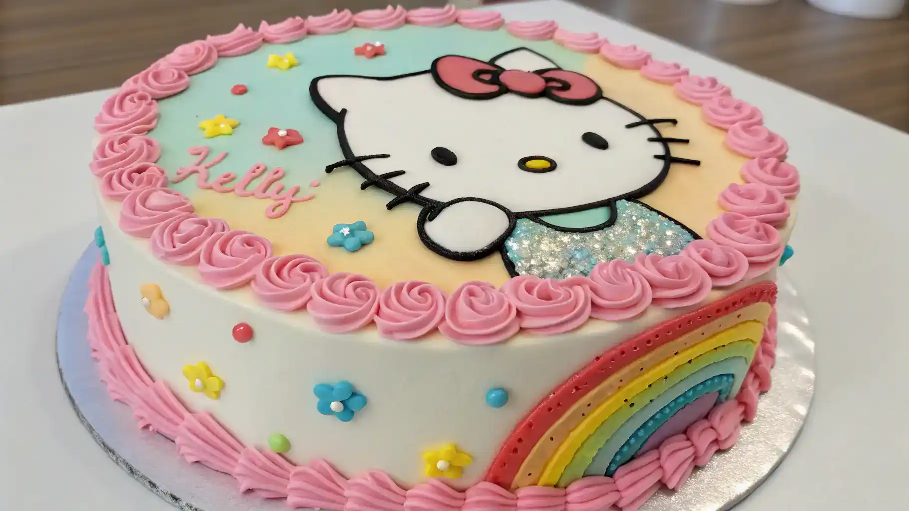 A beautifully decorated Hello Kitty cake with vibrant colors and details.